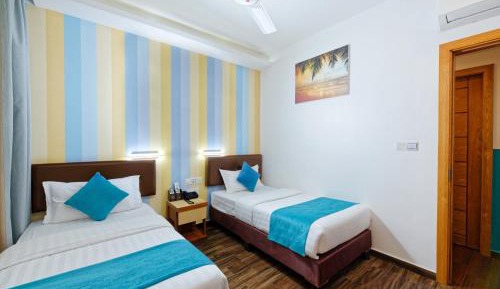 Deluxe Twin Room (Free Return Airport Transfer and 10% off on Food & Beverage)