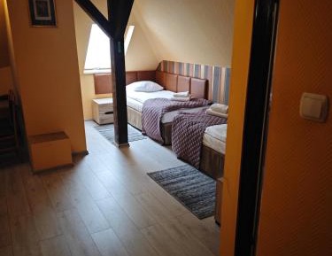 Quadruple Room in the attic with Sea View