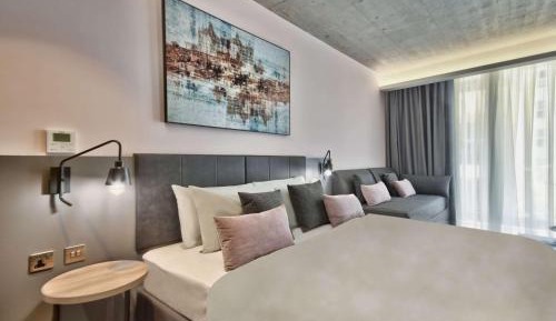 Junior Suite with One Double and Two Single Beds