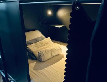 Single Bed in Male Dormitory Room with Shared Bathroom