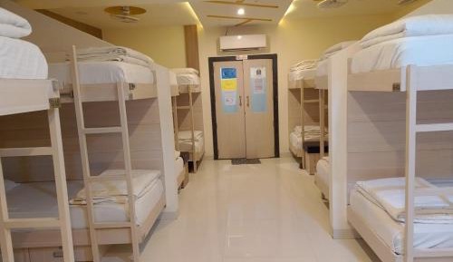 Single Bed in Male Dormitory Room with Shared Bathroom