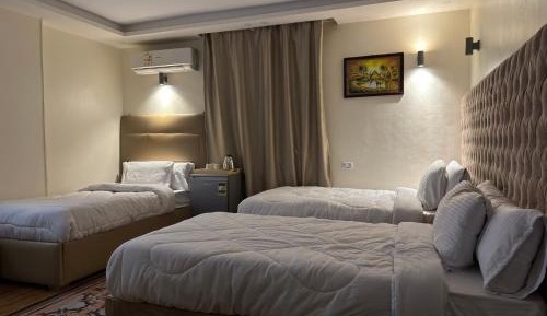 Quadruple Room with Private Bathroom