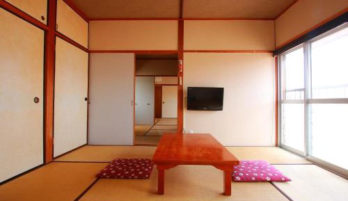 Japanese-Style Family Room with Shared Bathroom