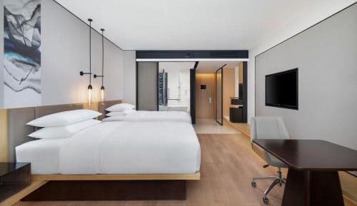 Deluxe Double Room with Two Double Beds, Balcony and City View