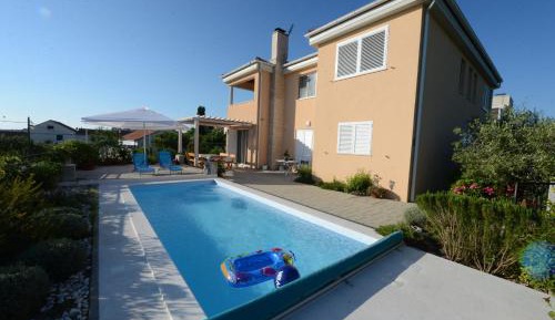Three-Bedroom Apartment with Heating Pool