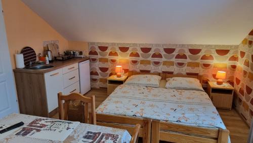 Quadruple Room with Private Bathroom