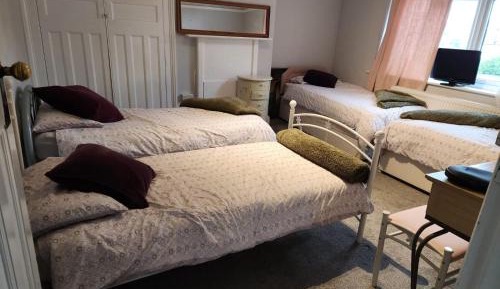 Economy Quadruple Room with Shared Bathroom