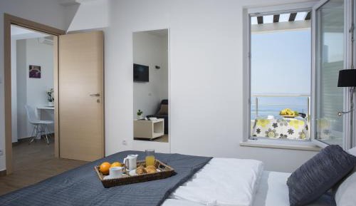 One-Bedroom Apartment with Balcony and Sea View