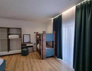 Quadruple Room with Balcony