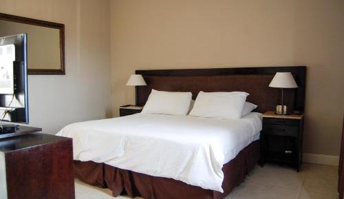 Resort King Guest Room with One Queen Bed