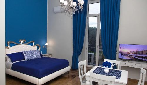 Quadruple Room with Private Bathroom