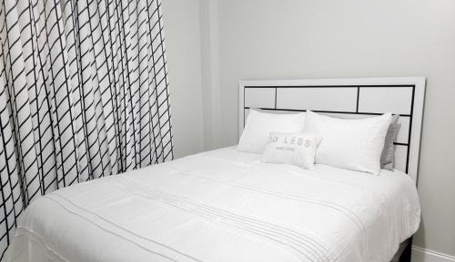Queen Room with Shared Bathroom