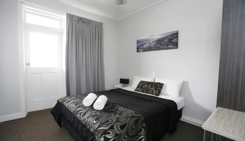 Queen Room with Shared Bathroom