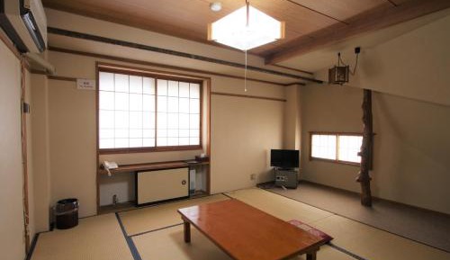 Japanese-Style Family Room with Shared Bathroom