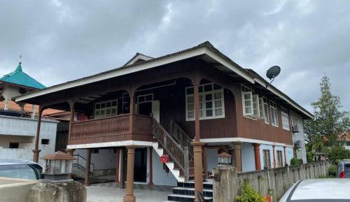 Six-Bedroom House