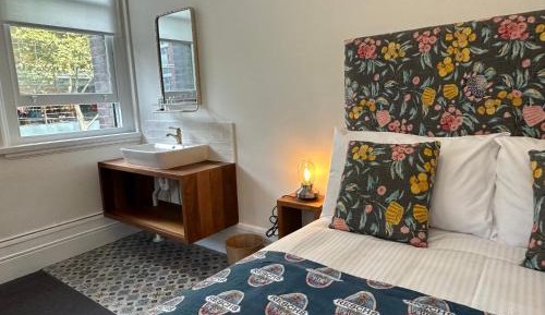 1st Floor Corner Room with Shared Bathroom