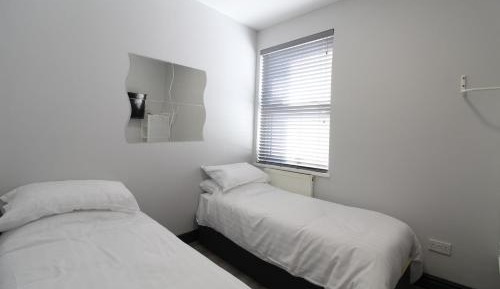 Standard Double Room with Shared Bathroom