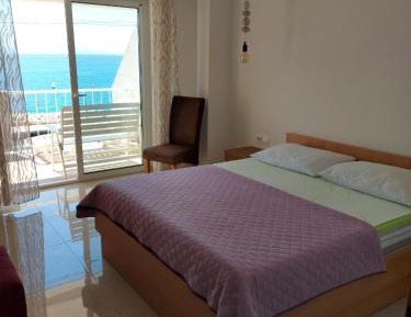 Three-Bedroom Apartment with Balcony and Sea View