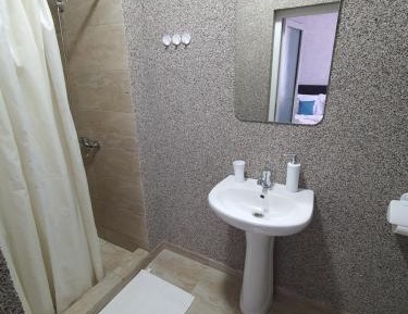 Quadruple Room with Private Bathroom