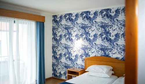 Twin Room with Partial Sea View
