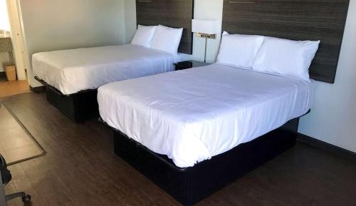 Efficiency Room with Two Double Beds - Smoking