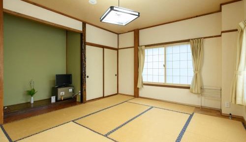 Quadruple Room with Shared Bathroom