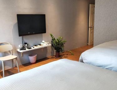 Quadruple Room with Private Bathroom