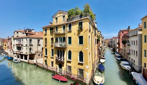 One-Bedroom Apartment with Balcony and Canal View