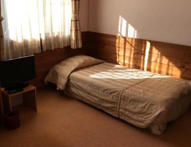 Quadruple Room with Shared Bathroom
