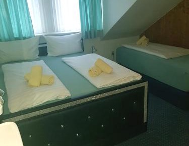 Triple Room with Shared Bathroom