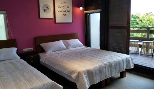Deluxe Quadruple Room with Balcony