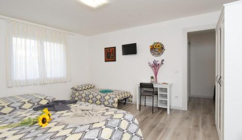 Quadruple Room with Private Bathroom
