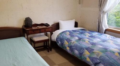 Twin Room with Shared Bathroom - Non Smoking