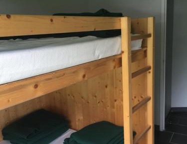 Single Bed in Dormitory Room