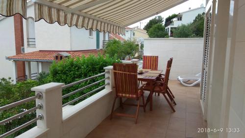 Two-Bedroom Apartment with Balcony and Sea View