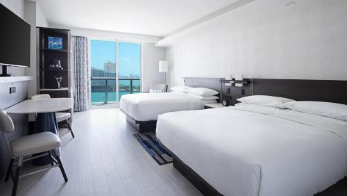 Queen Room with Two Queen Beds, Balcony and Bay View