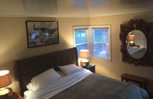 Milford House | Glacial lake on top of mountain, boats, floating dock, fishing, swimming, beach.
