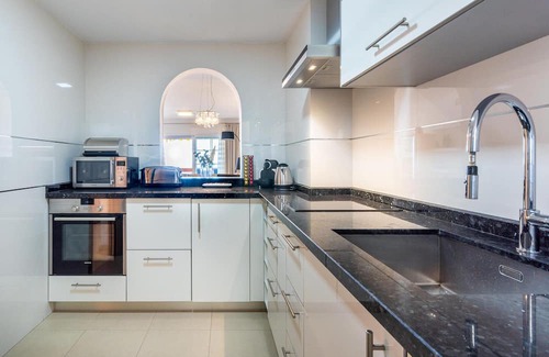 Rincon de la Victoria Apartment | Comfortable, attractively located vacation home with shared pool and panoramic sea views.