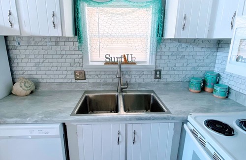 Garden City House | One minute drive to beach with golfcart! Newly updated, beach decor and clean!