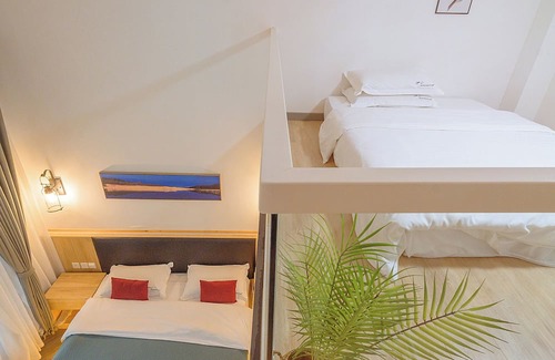 Emeishan House | Room-heinemann Hotel Loft Suite With two