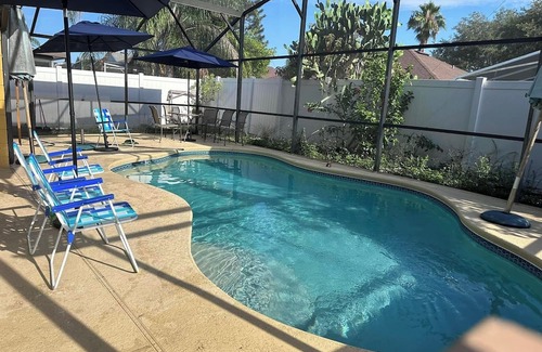Esprit House | Spacious 4-bedroom house in delightful Davenport with WiFi, AC And Near Disney