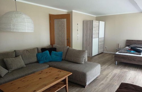 Aventoft Apartment | Apartment 'Ferienwohnung Sort Sol' with Shared Terrace, Shared Garden and Wi-Fi