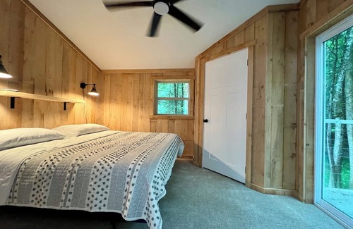 Muddy Pond Cabin | Secluded cabin beside private river, surrounded by peaceful nature
