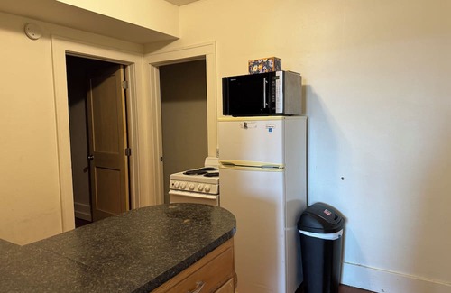 Miller Apartment | Cozy 2-bedroom apartment with WiFi, AC in downtown Miller with rooftop patio.