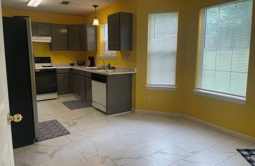 Lithonia House | 4-bedroom home in welcoming Stonecrest with WiFi, fitness area, AC