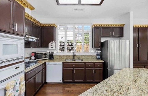 Greenacres House | Back Yard with Lawn & Dedicate Office & Single-Story