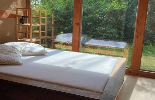 Huy House | Tiny house in a large natural garden