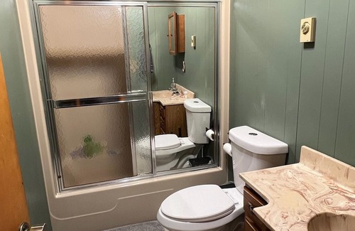 Lake House | Blissful Bluff Lake Retreat: 4BR House with Sandy Beach & Walkout Basement