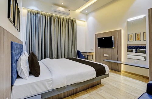 Goregaon East Hotel | OYO Flagship Hotel Global Spaces