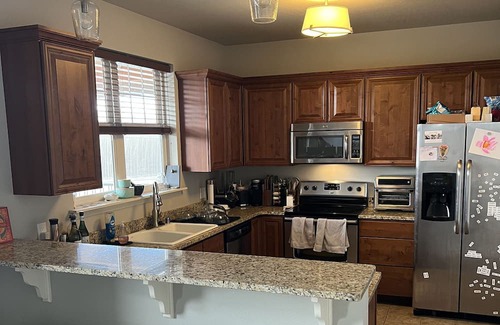 Missoula Condo | Cozy condo minutes from downtown with lofted ceilings and spacious rooms!